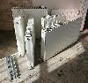 Set of six matching PURMO premium quality central heating radiators with TRVs