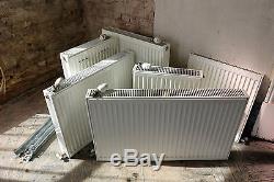Set of six matching PURMO premium quality central heating radiators with TRVs
